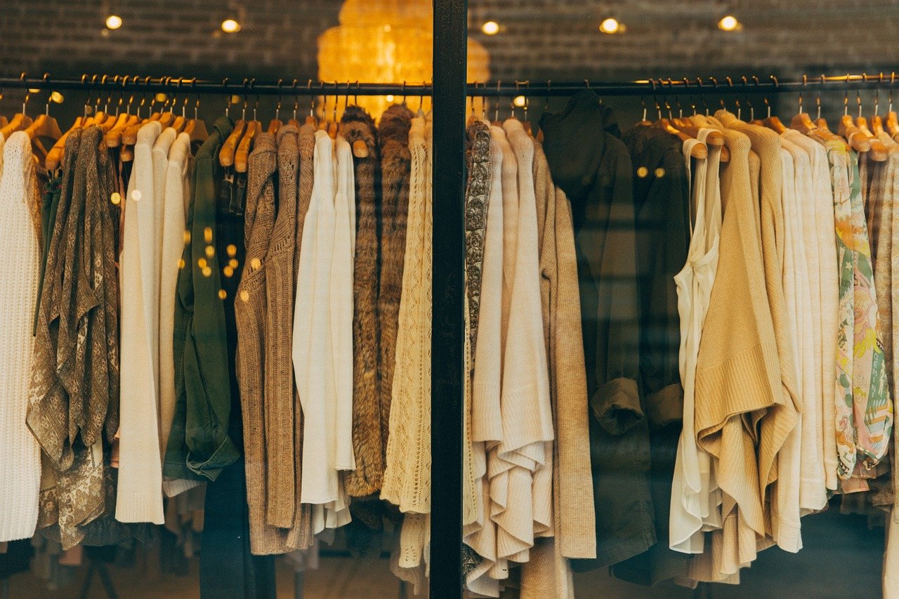 Brown clothes hanging on a rack